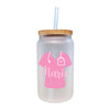 a glass jar with a straw in it