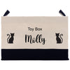 a toy box with a black cat on it