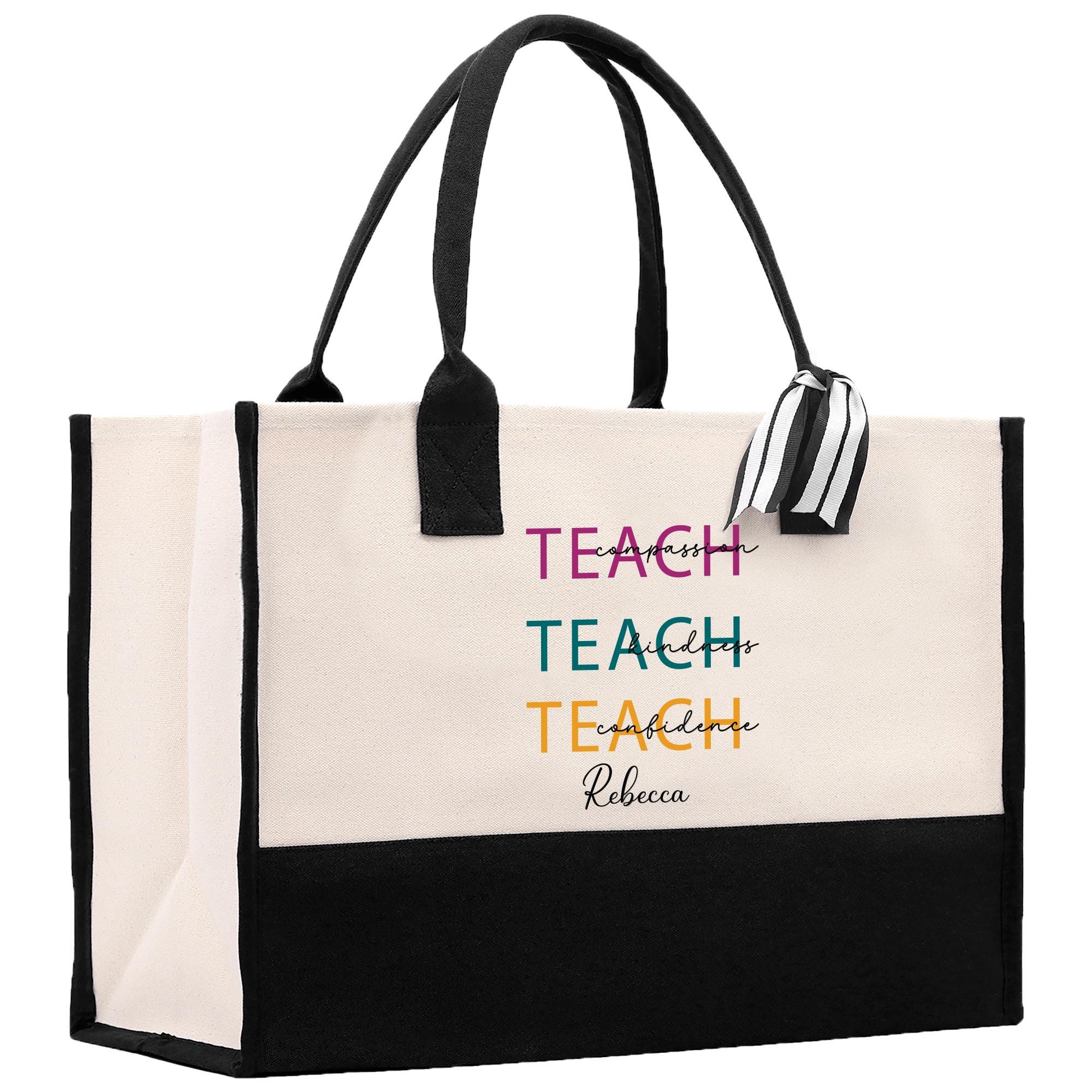 a black and white tote bag with a teacher written on it