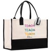 a black and white tote bag with a teacher written on it