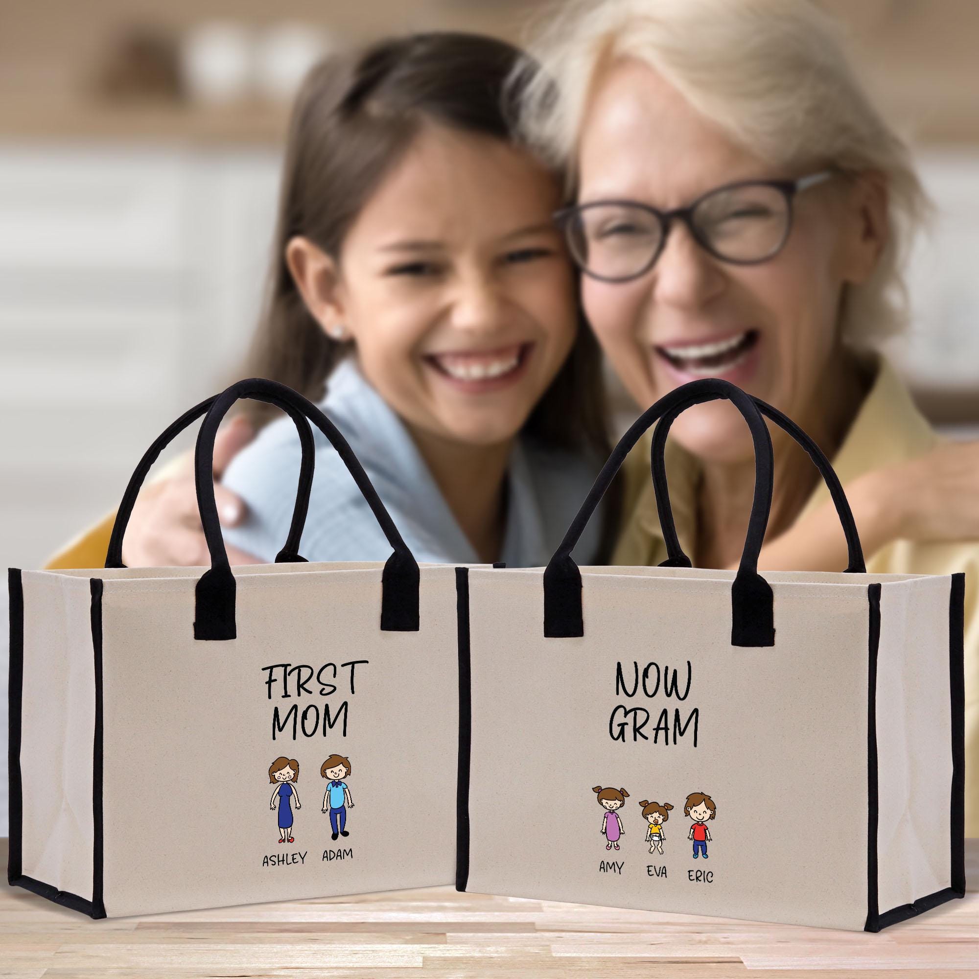 Two bags with text and illustrations, one bag says &quot;FIRST MOM&quot; and the other says &quot;NOW GRAM&quot;, with illustrations of a family.