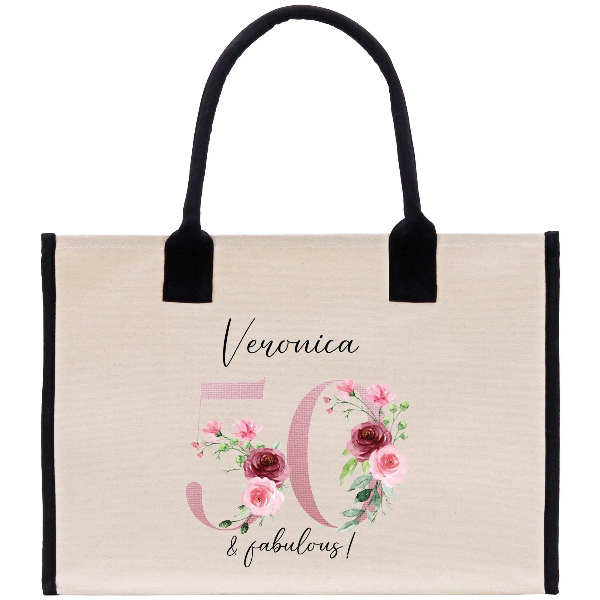 a canvas bag with flowers and the number 50 printed on it