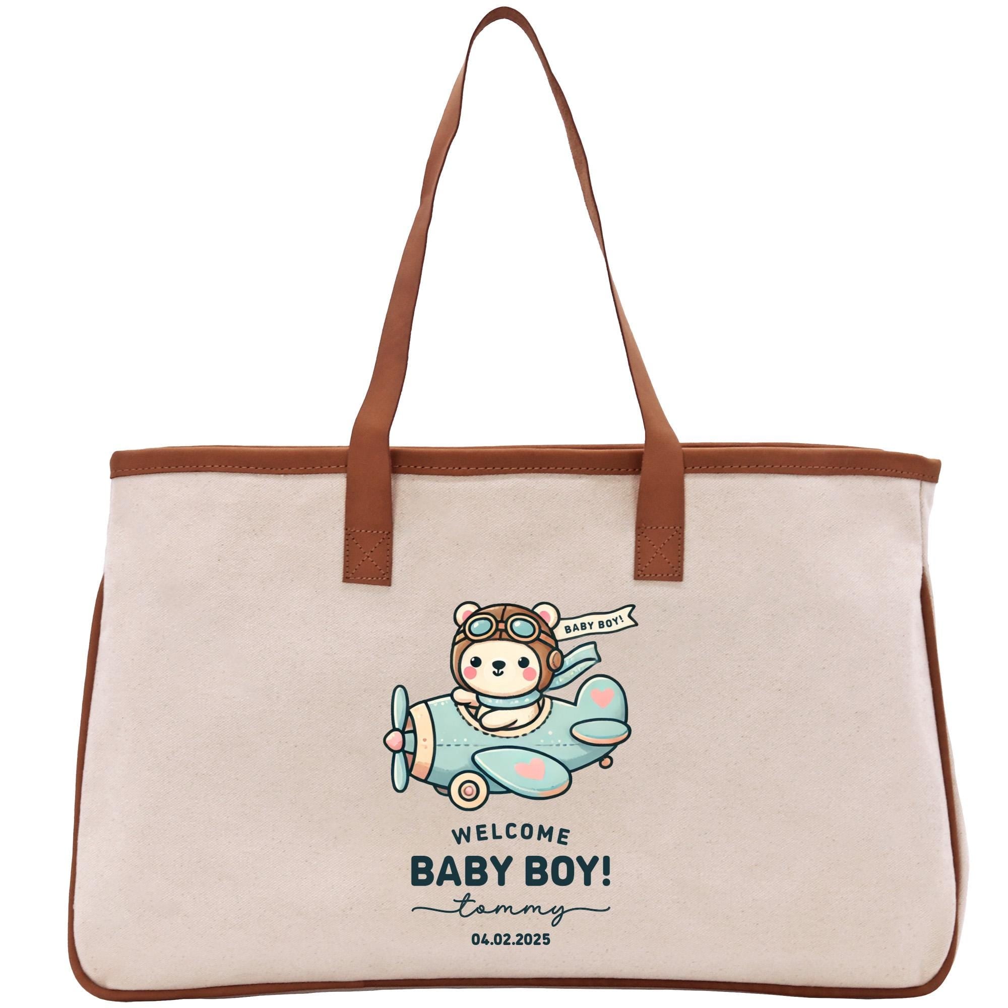 a canvas bag with a picture of a baby boy on it