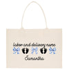 a white bag with a blue ribbon and footprints on it