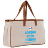 a canvas bag with a brown leather handle