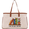 A beige tote bag with a printed design on it, depicting a bookshelf with colorful books and a potted plant. The text below the design reads "I HAVE NO SHELF CONTROL".