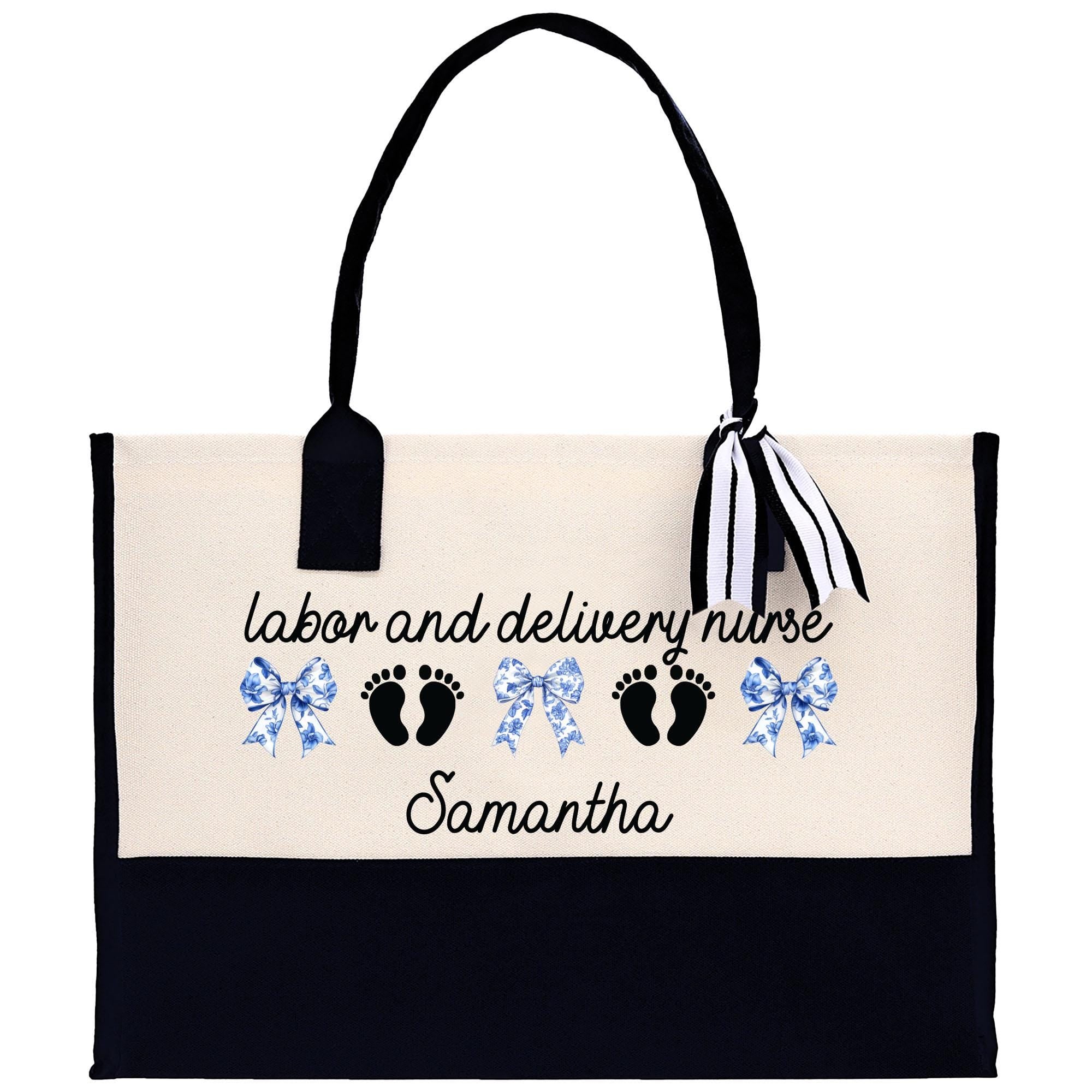 a black and white bag with a blue ribbon on it