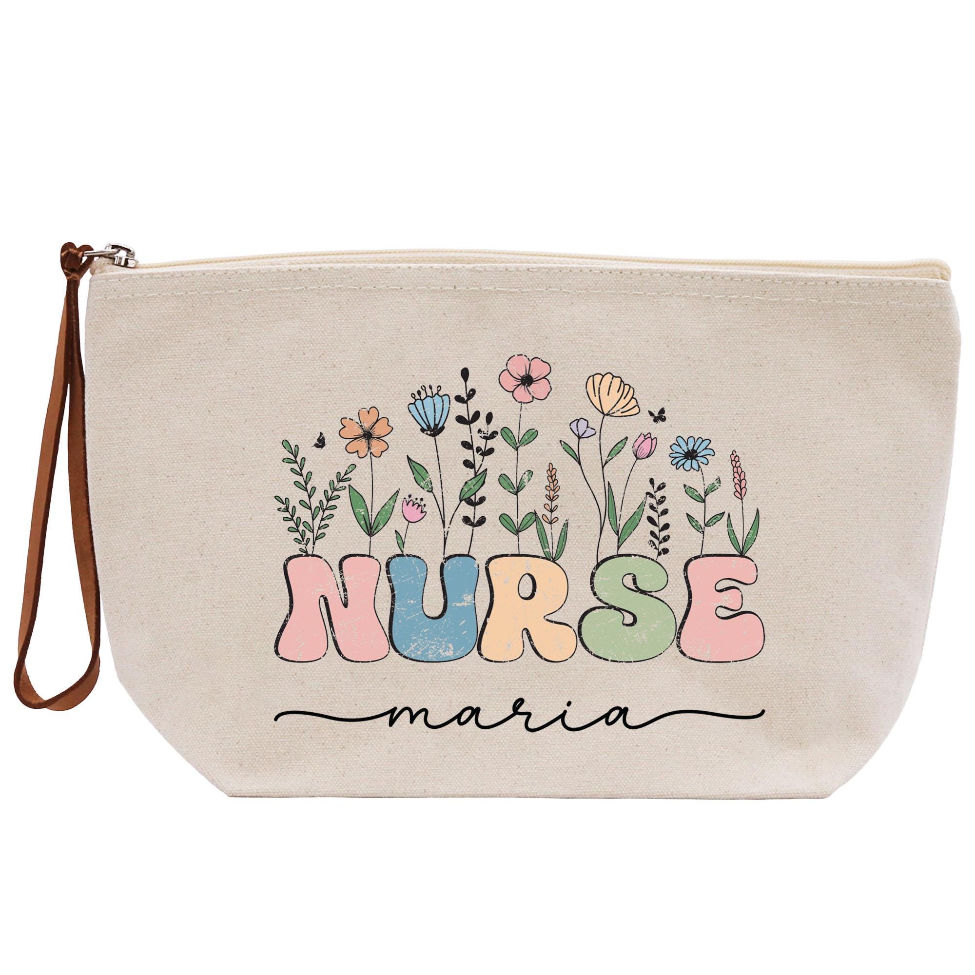 a white bag with a floral design on it