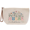 a white bag with a floral design on it