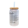 a glass jar with a straw inside of it