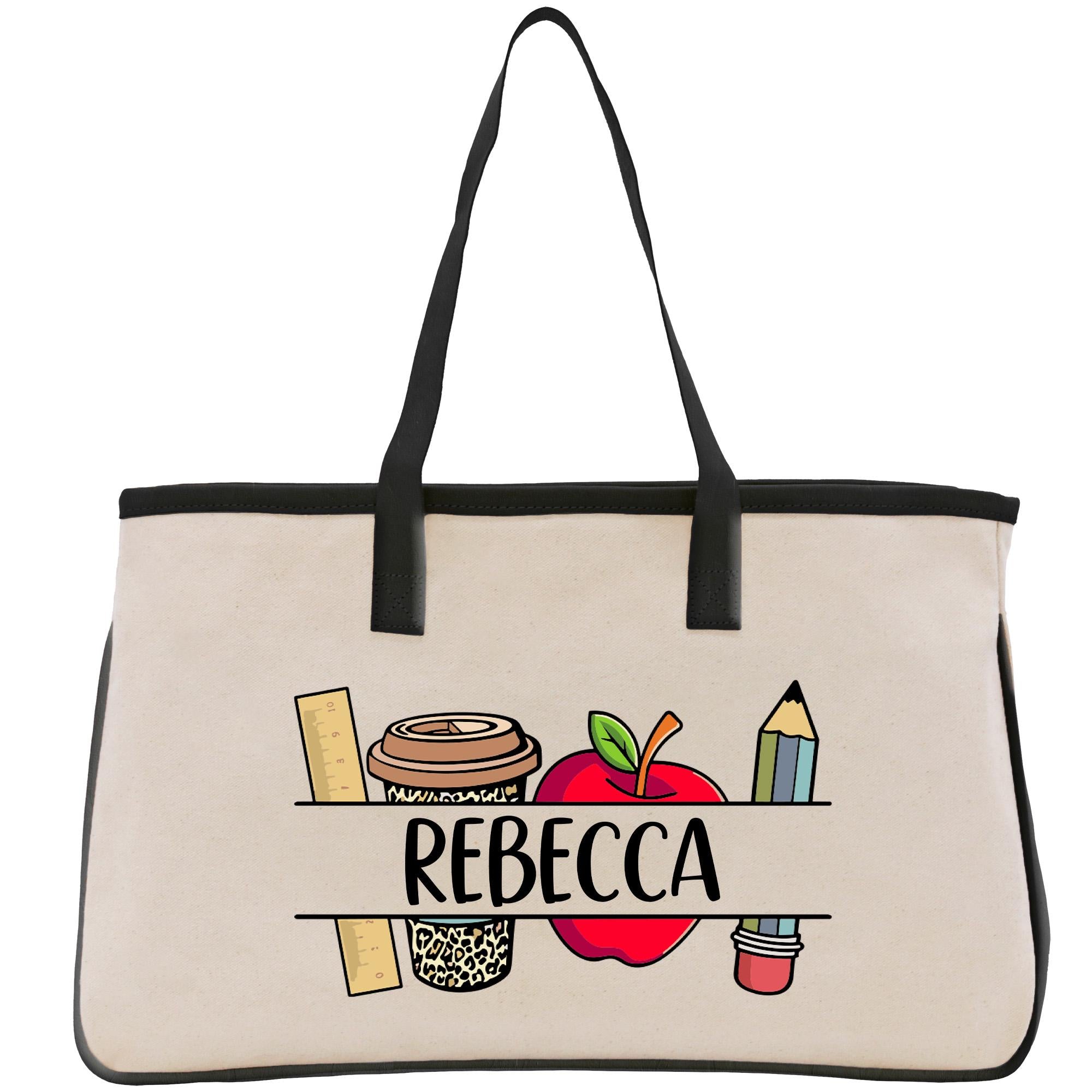 a white bag with a black handle and a picture of an apple