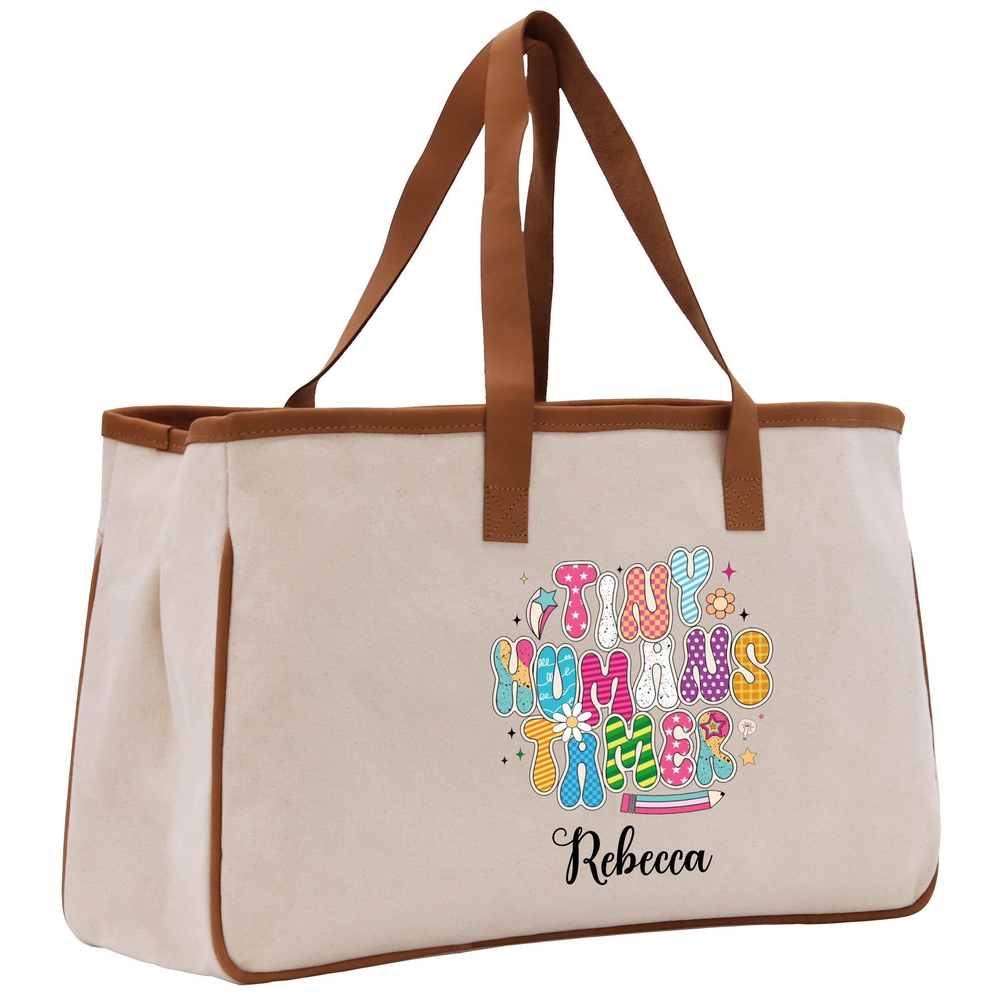 A beige canvas tote bag with a personalized printed design on it.