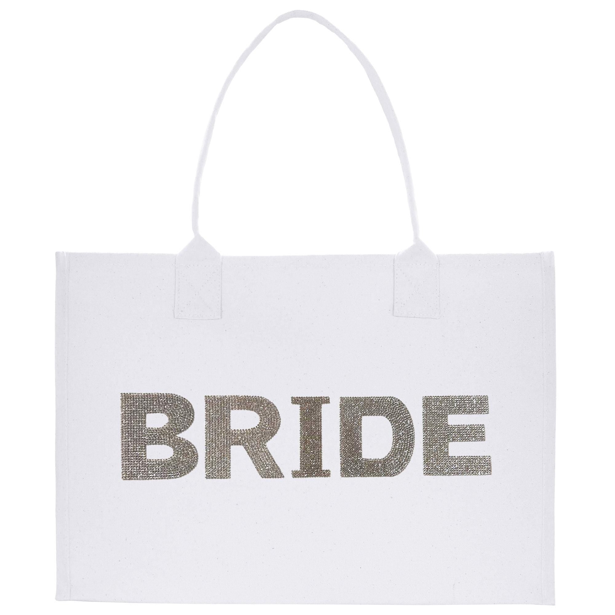 A white tote bag with the word &quot;BRIDE&quot; printed on it in a metallic, glittery font.