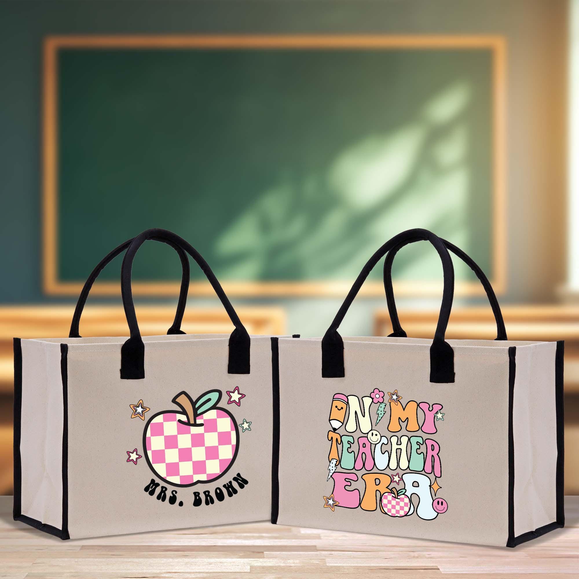 a pair of shopping bags sitting on top of a table