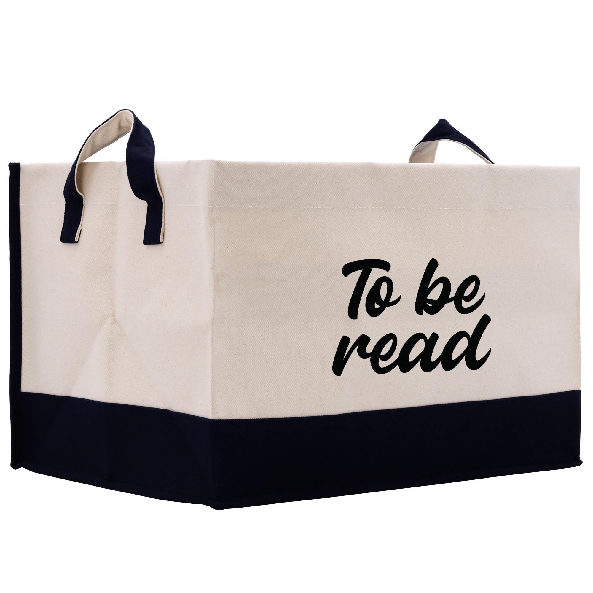 a tote bag with the words to be read printed on it