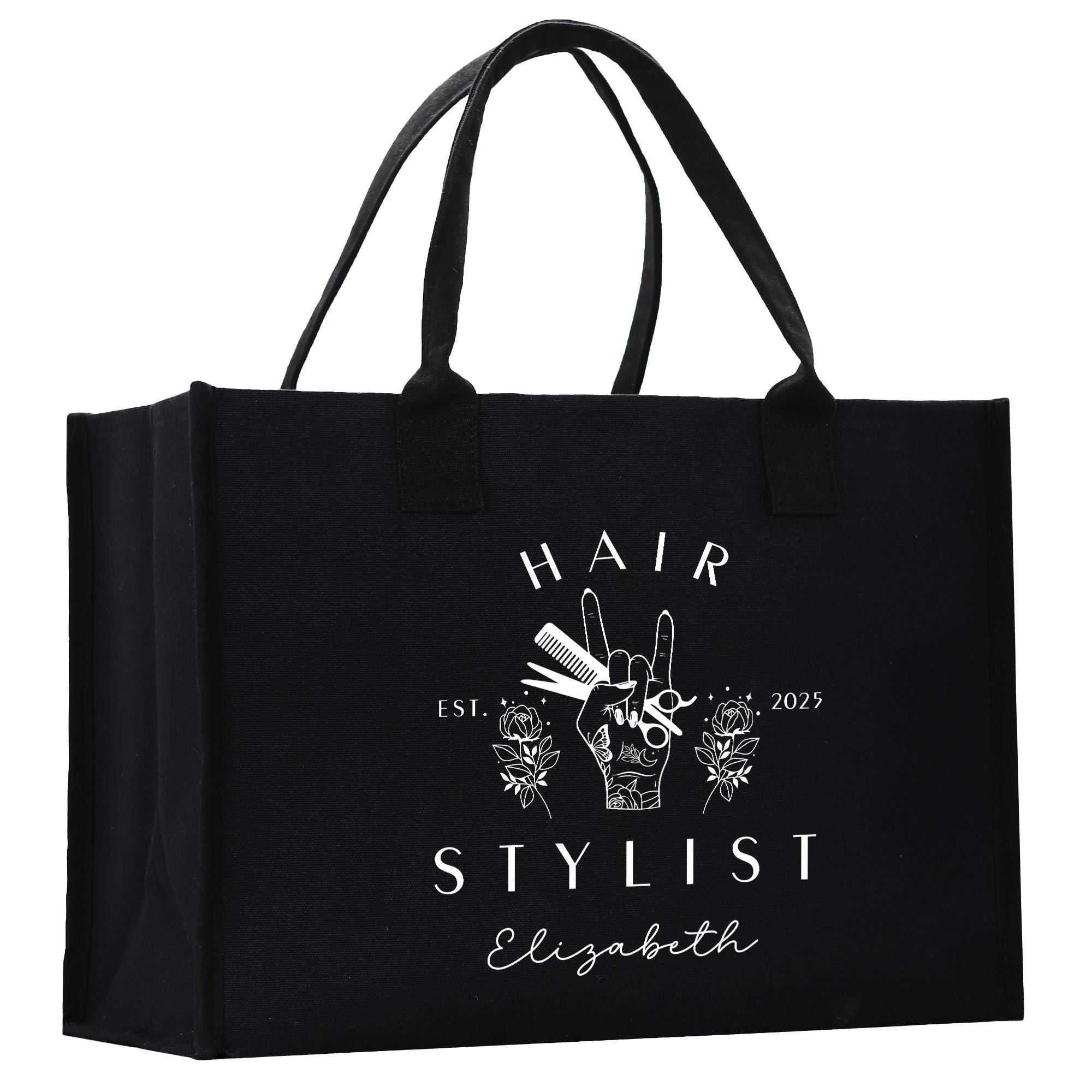 a black shopping bag with the words hair stylist on it