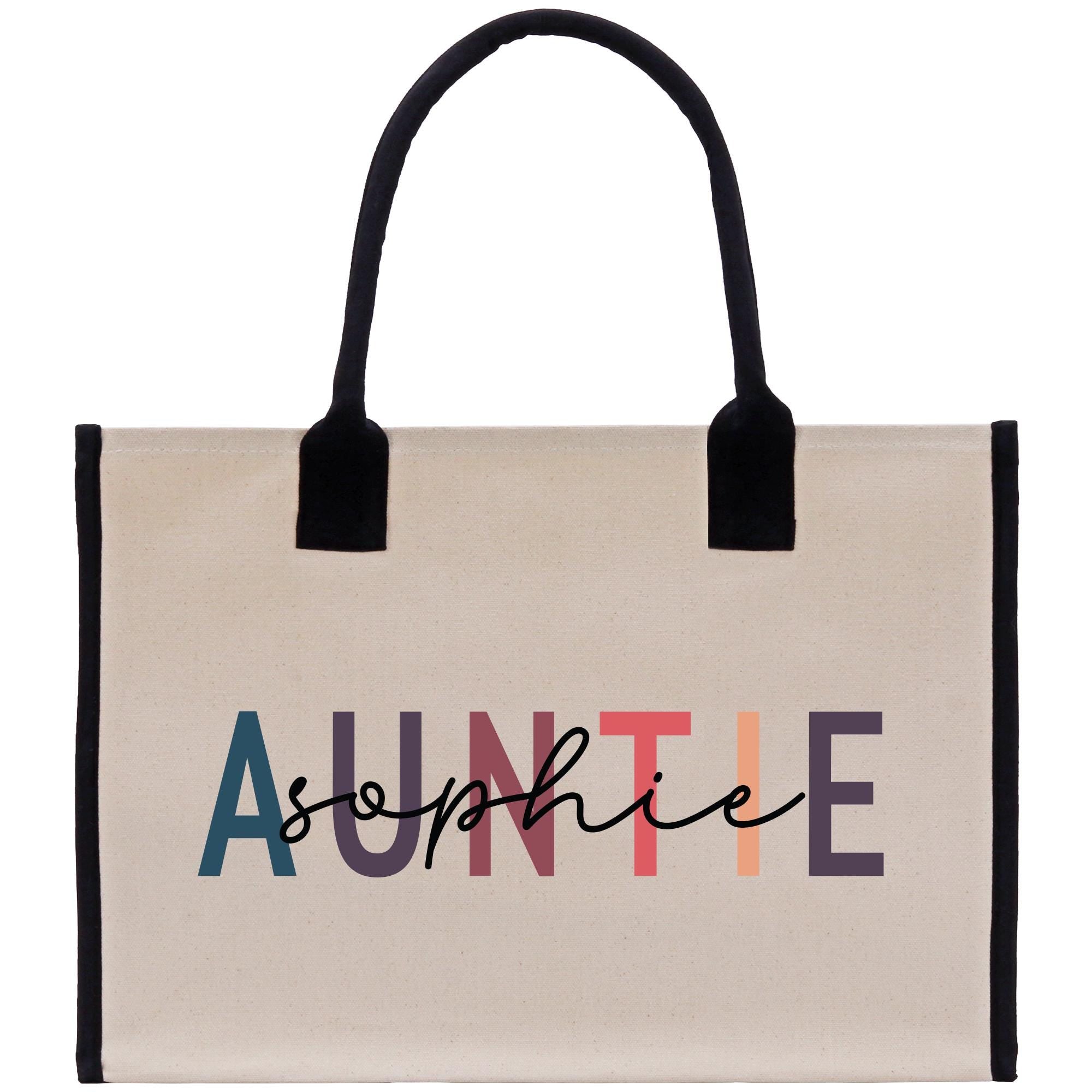 a tote bag with the word asyntie printed on it