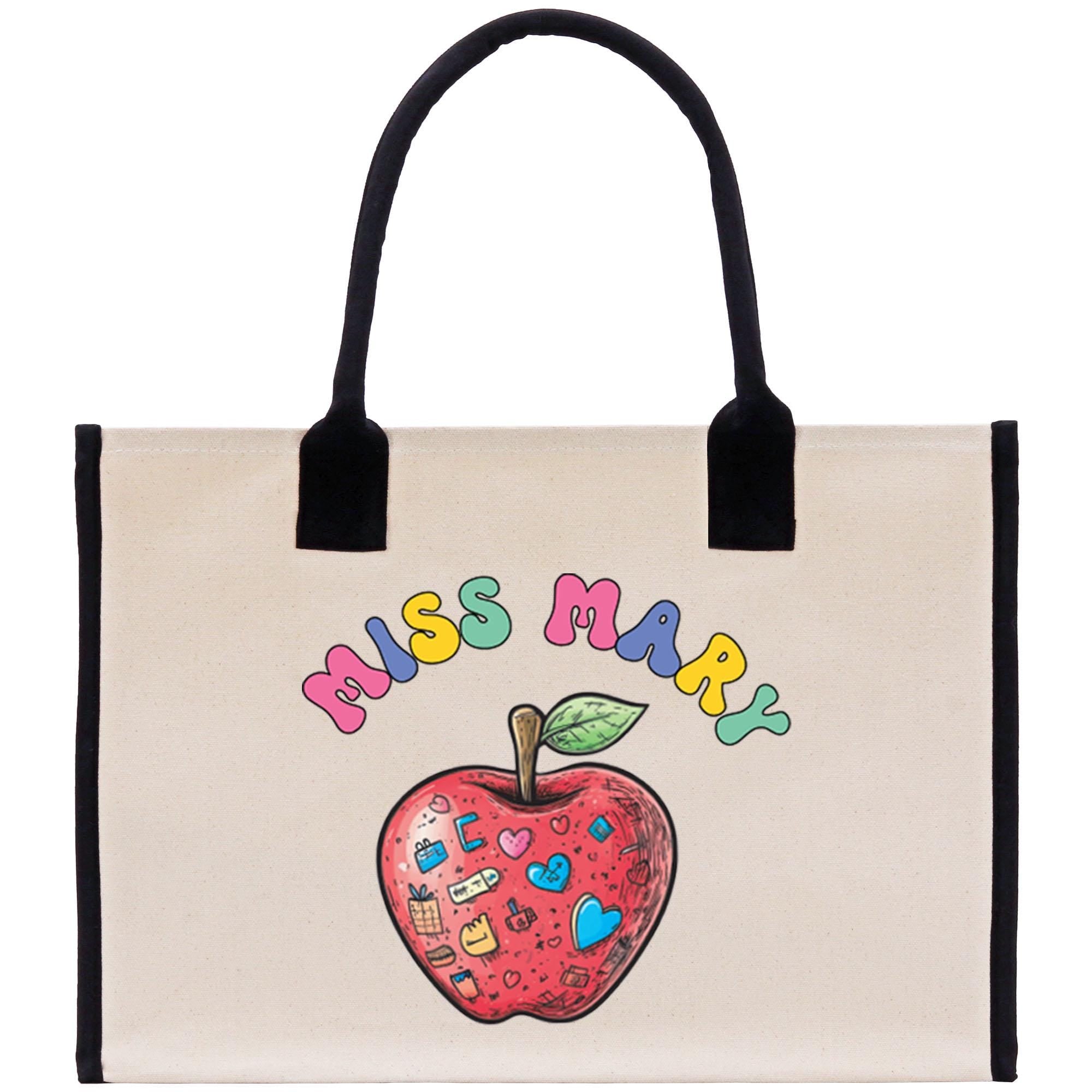 a white bag with a red apple on it