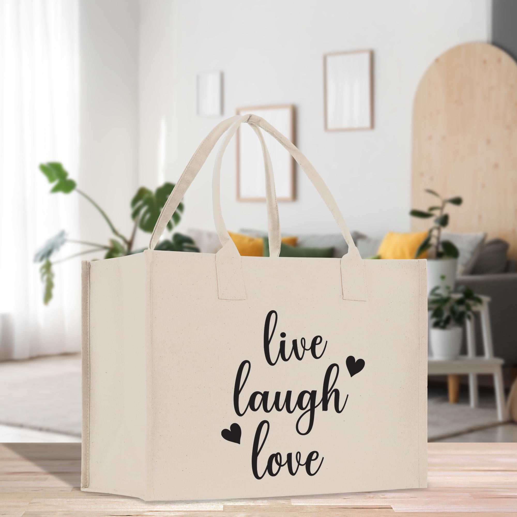 a bag that says live laugh love on it