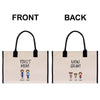 two beige tote bags with the text "FIRST MOM" and "NOW GRAM" printed on them. The bags also have illustrations of two children and their names, Ashley and Eric.