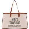 a canvas bag with a brown leather handle