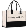 a black and white tote bag with the word mrs smith on it