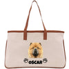 A beige tote bag with a brown handle and a printed image of a chow dog's face, along with the name "OSCAR" below it.