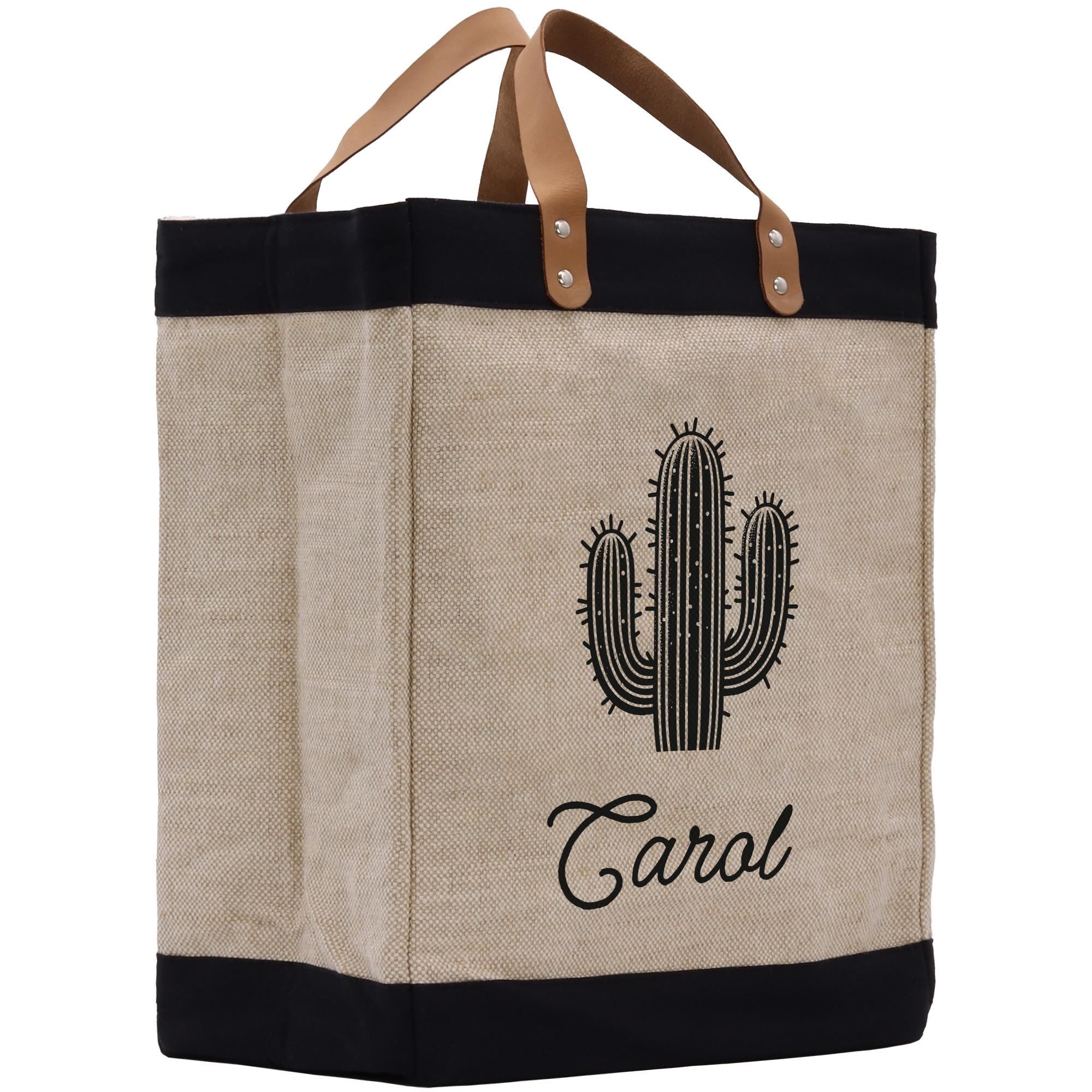 A beige tote bag with a black handle and strap, featuring a black cactus graphic and the name &quot;Carol&quot; printed on it.