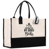 a black and white bag with a dog's name on it