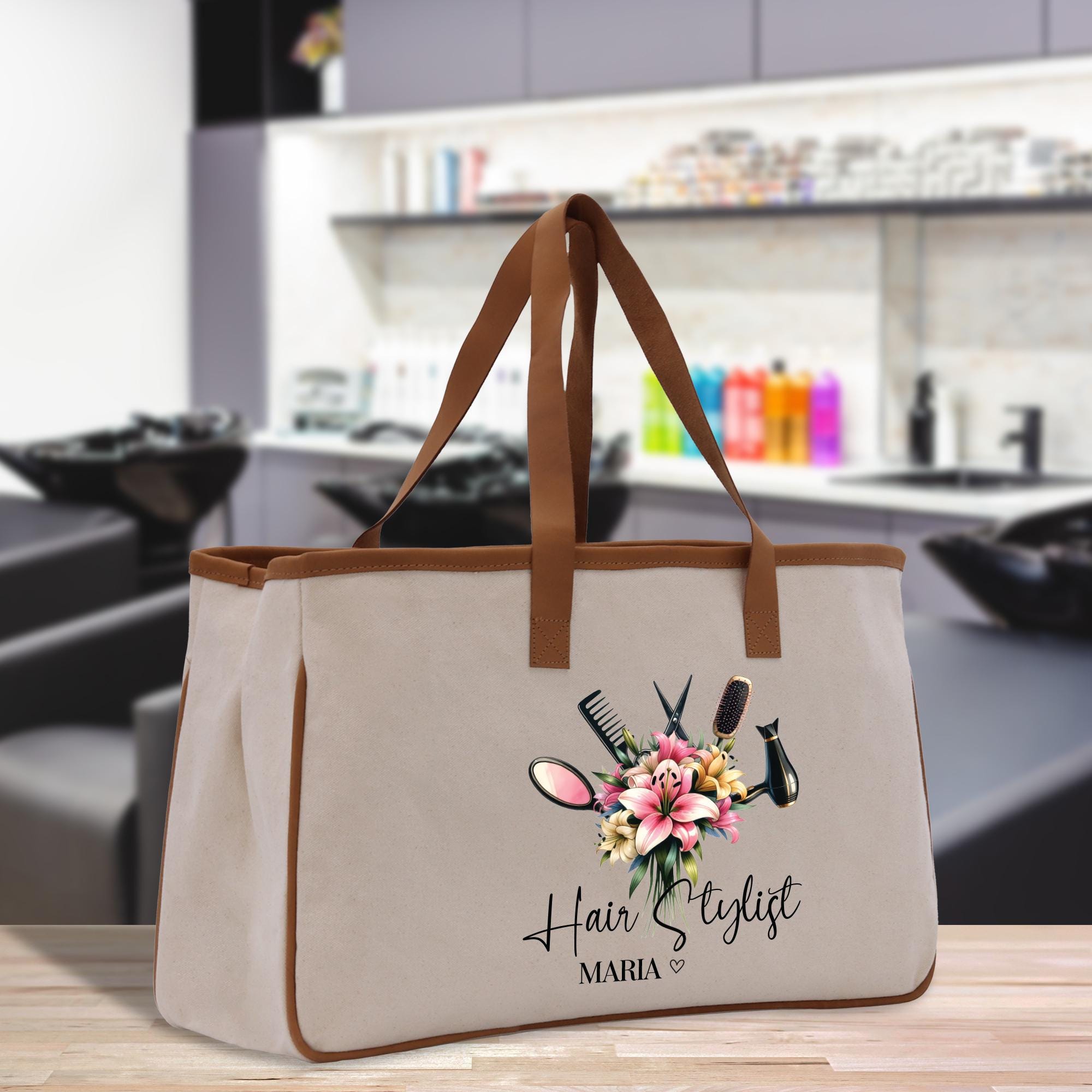 a canvas bag with a hair stylist logo on it