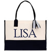 A black and white tote bag with the name "LISA" printed on it in blue letters.