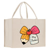 a white shopping bag with a pencil and apple on it