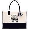 A tote bag with a black and white design featuring a boat and the text 