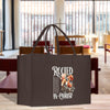 a brown bag sitting on top of a wooden table