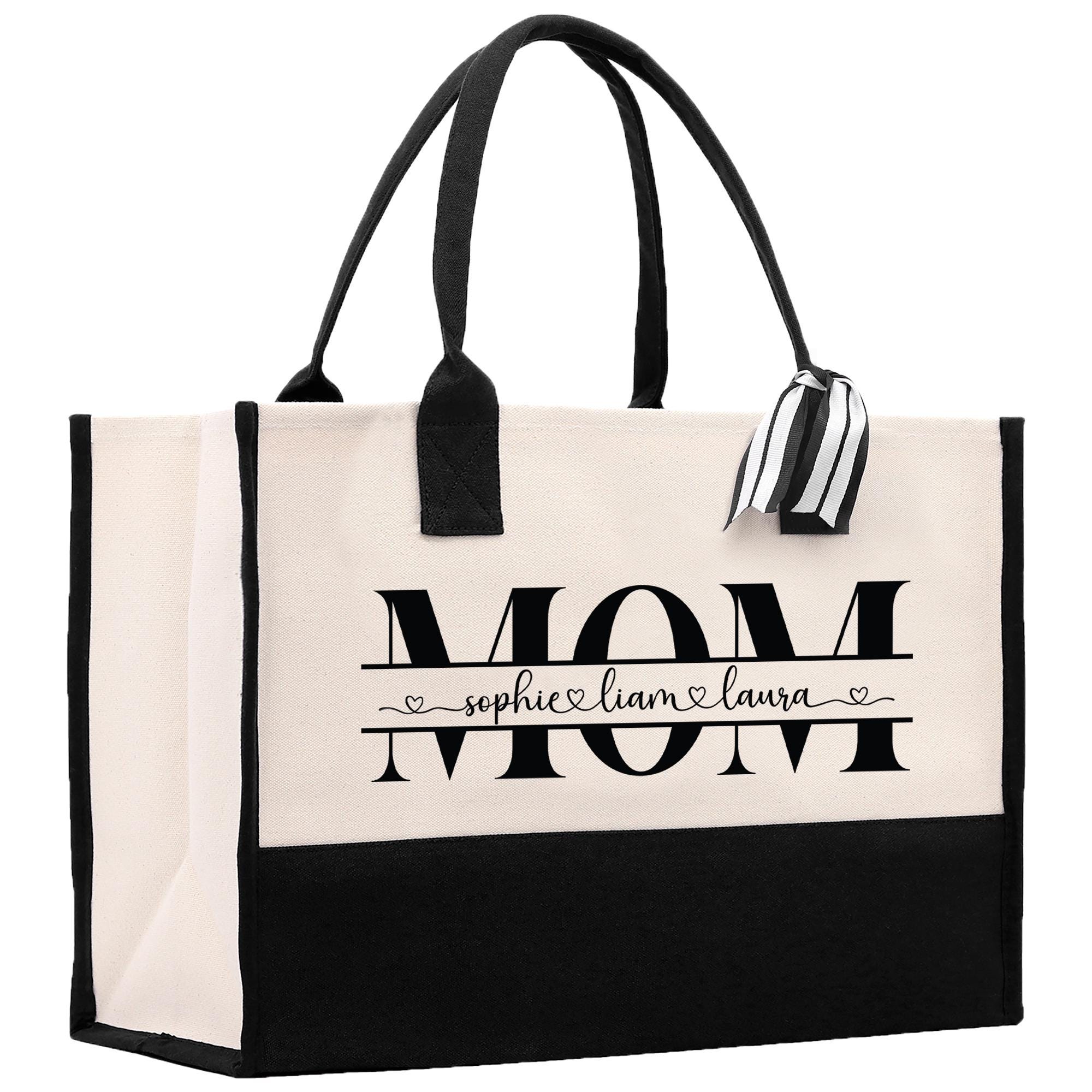 a black and white bag with the word mom printed on it
