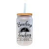 a white mason jar with a straw in it