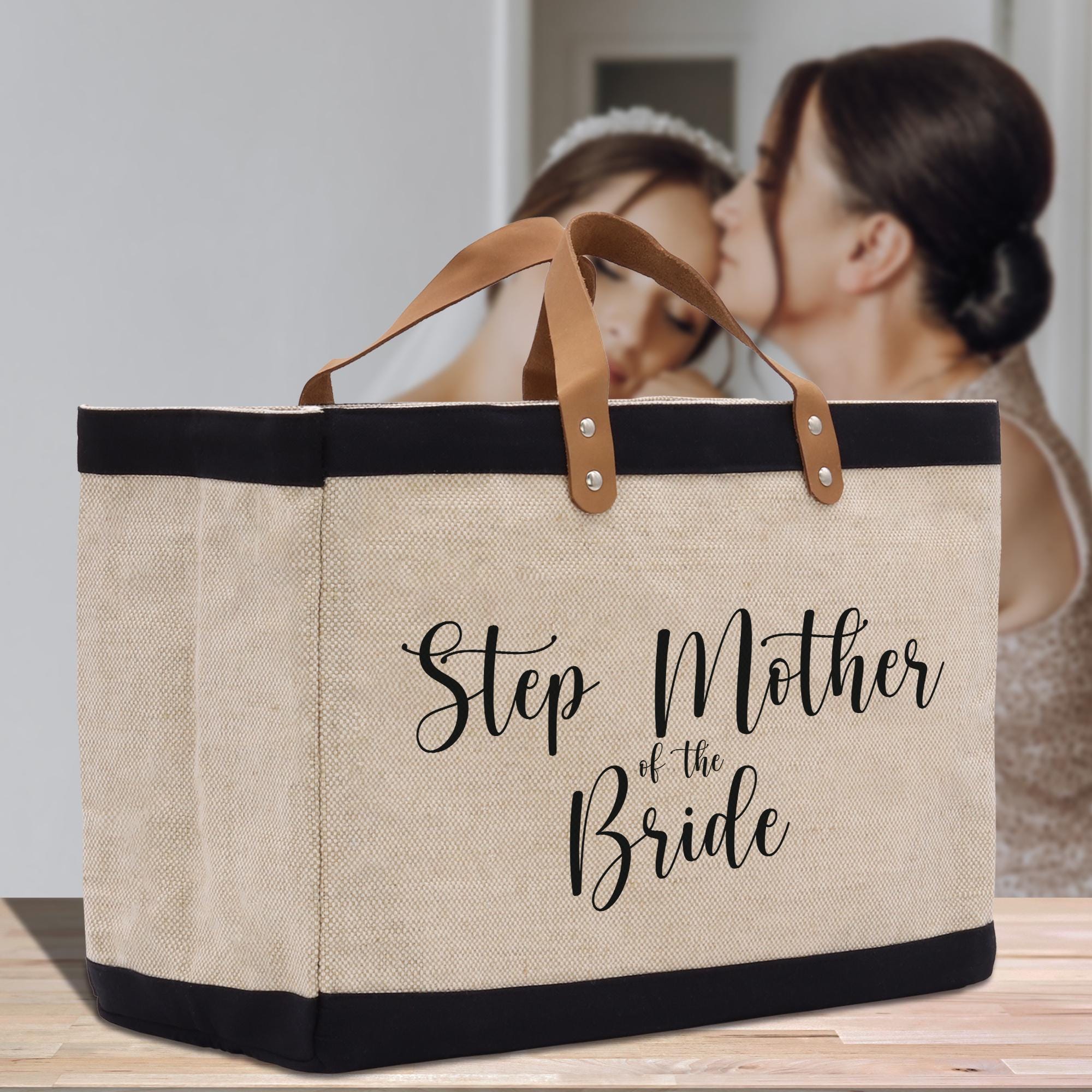 a woman kissing a man in front of a bag