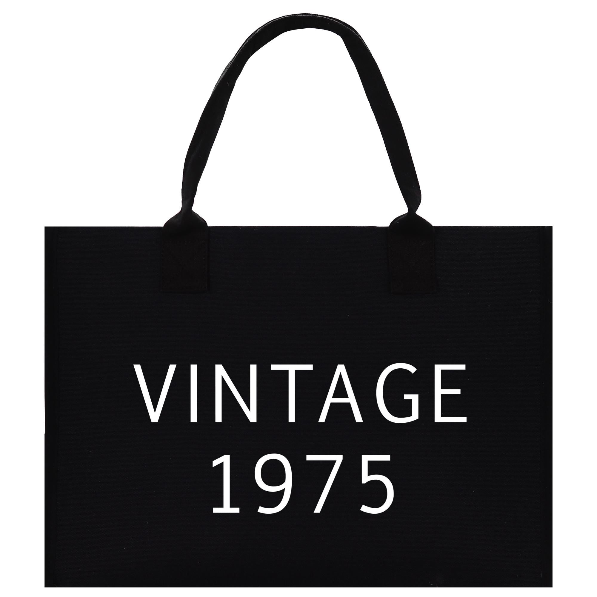 a black shopping bag with the words vintage written on it