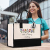 a woman holding a black and white shopping bag