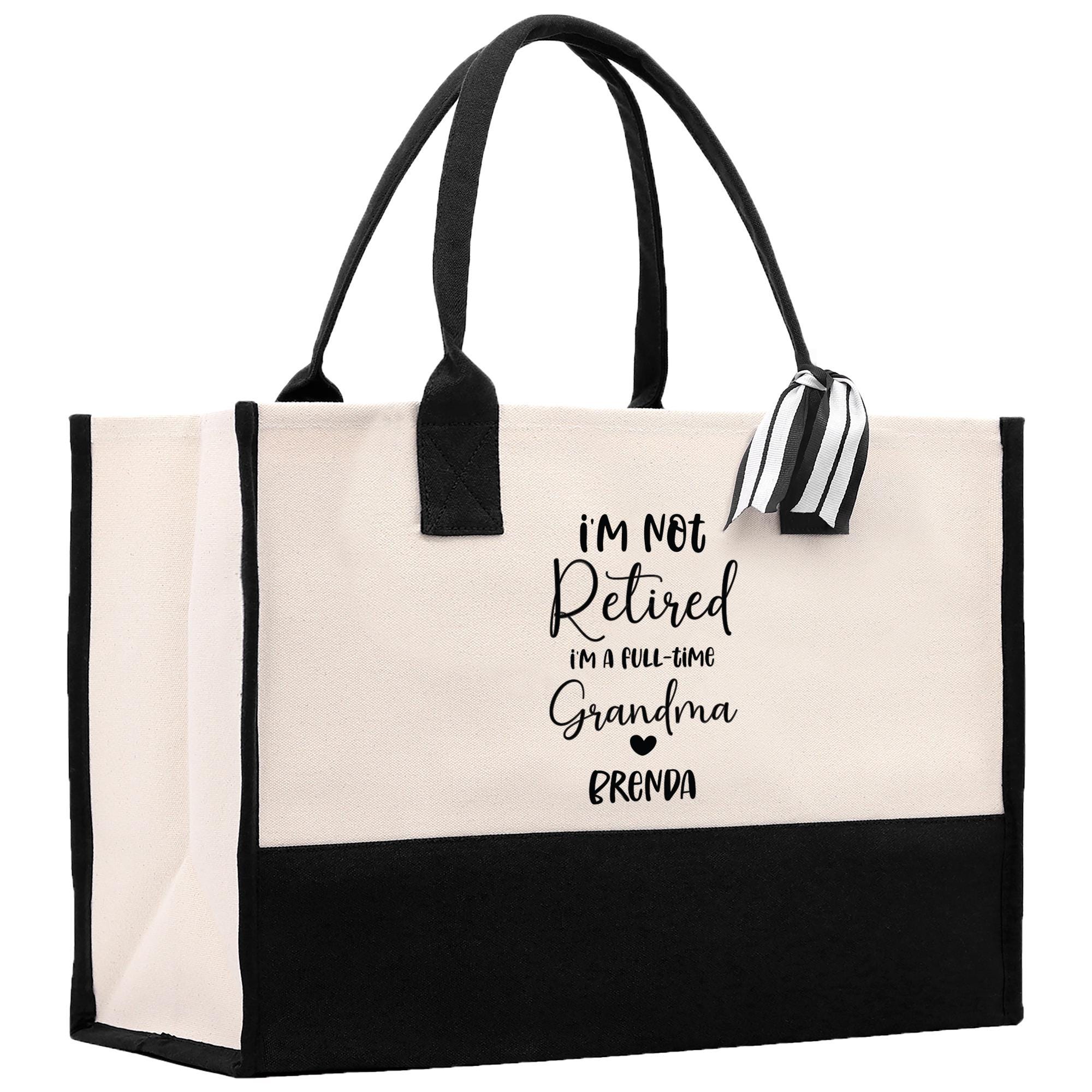 a black and white tote bag with the words i&#39;m not retired in