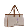 a white bag with a purple flower on it