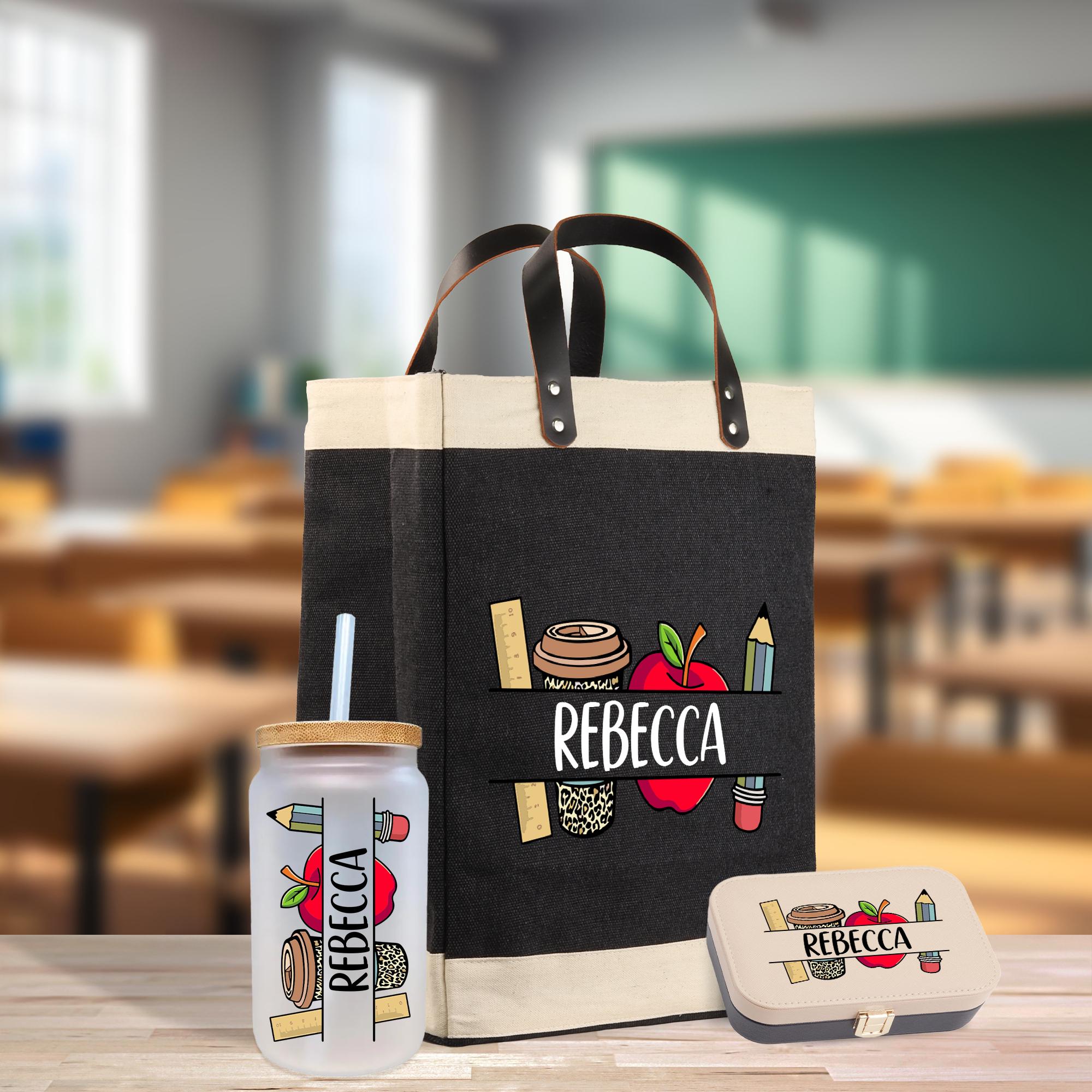 a reebca bag and a can of soda on a table