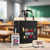 a reebca bag and a can of soda on a table
