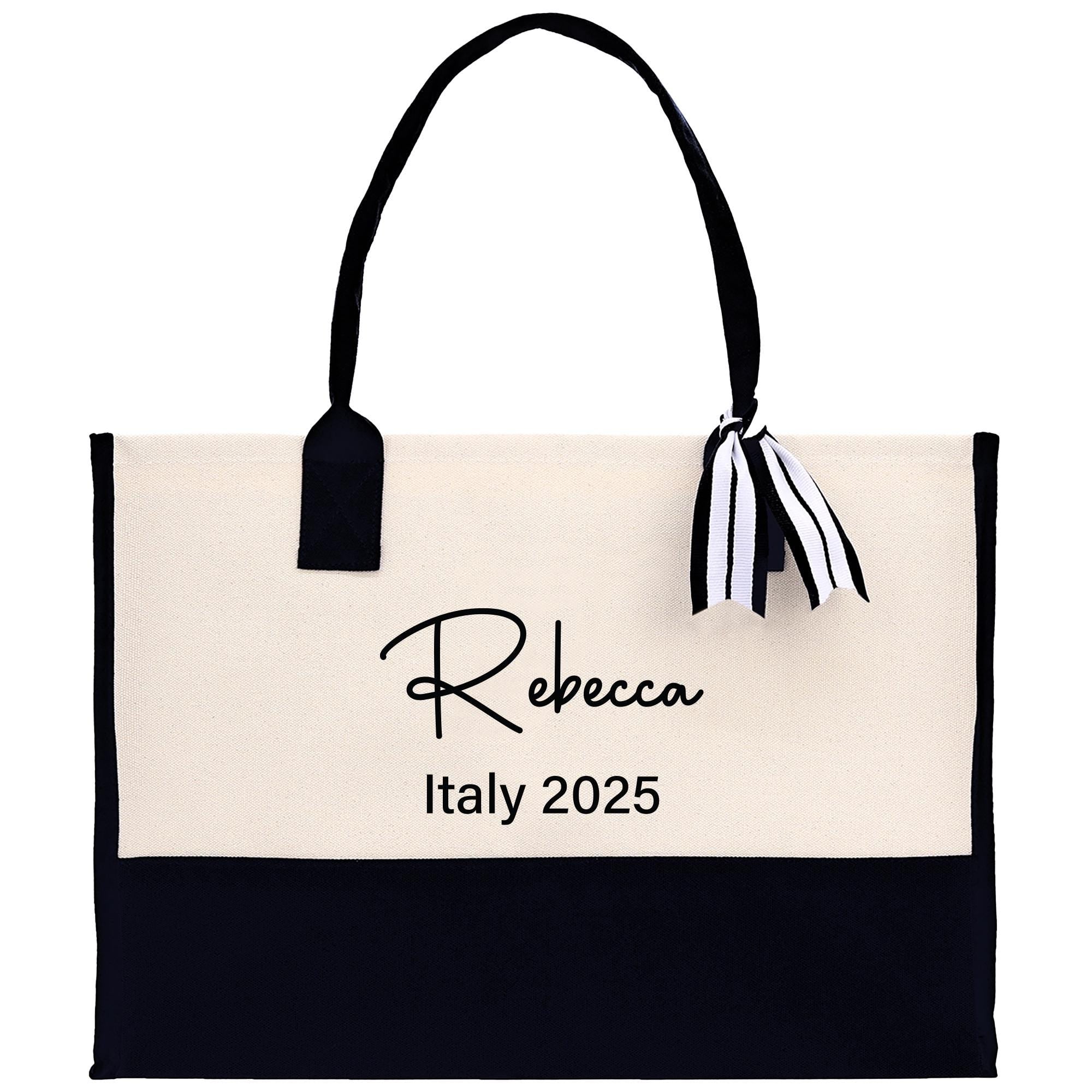 a black and white bag with a name tag on it