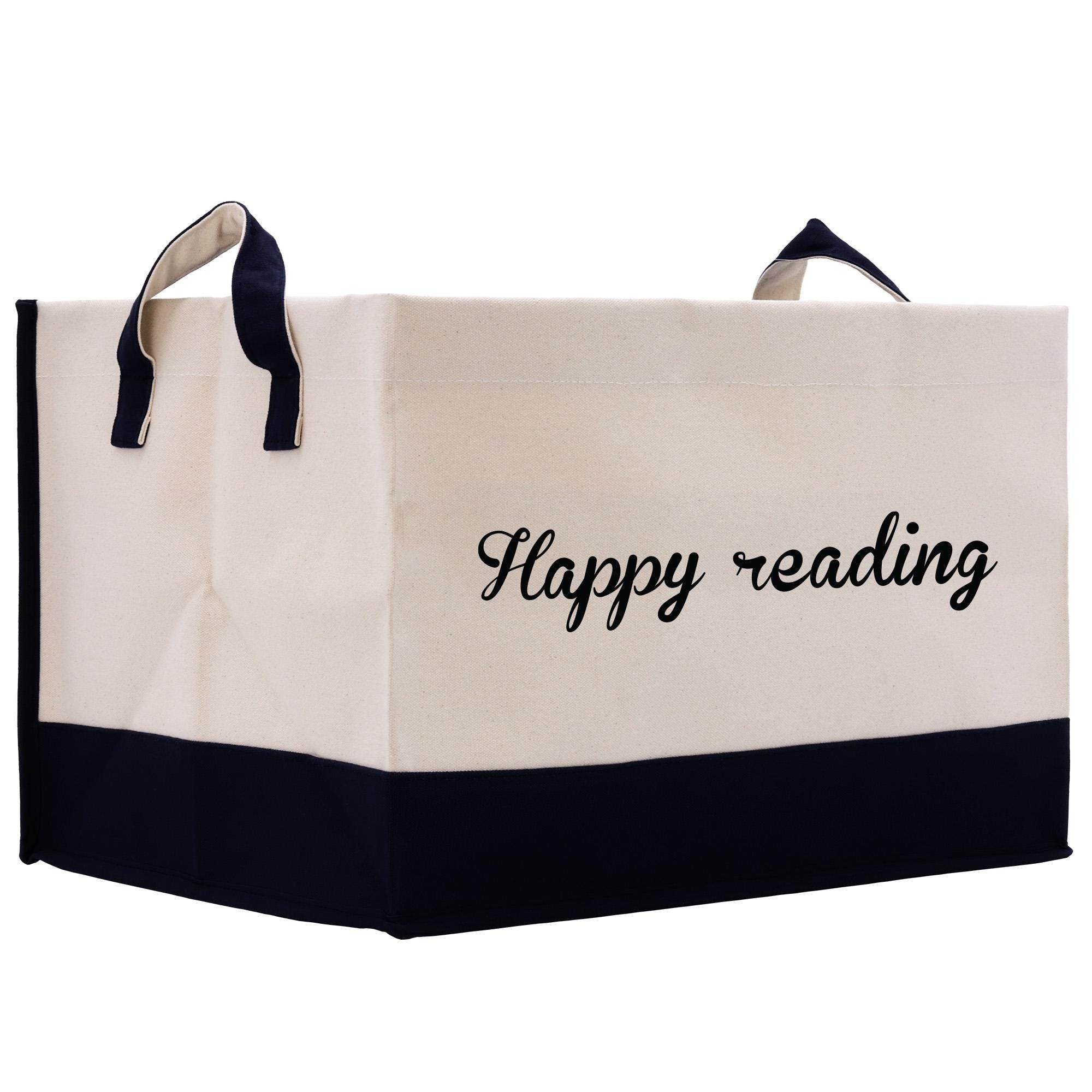 a black and white shopping bag with the words happy reading printed on it