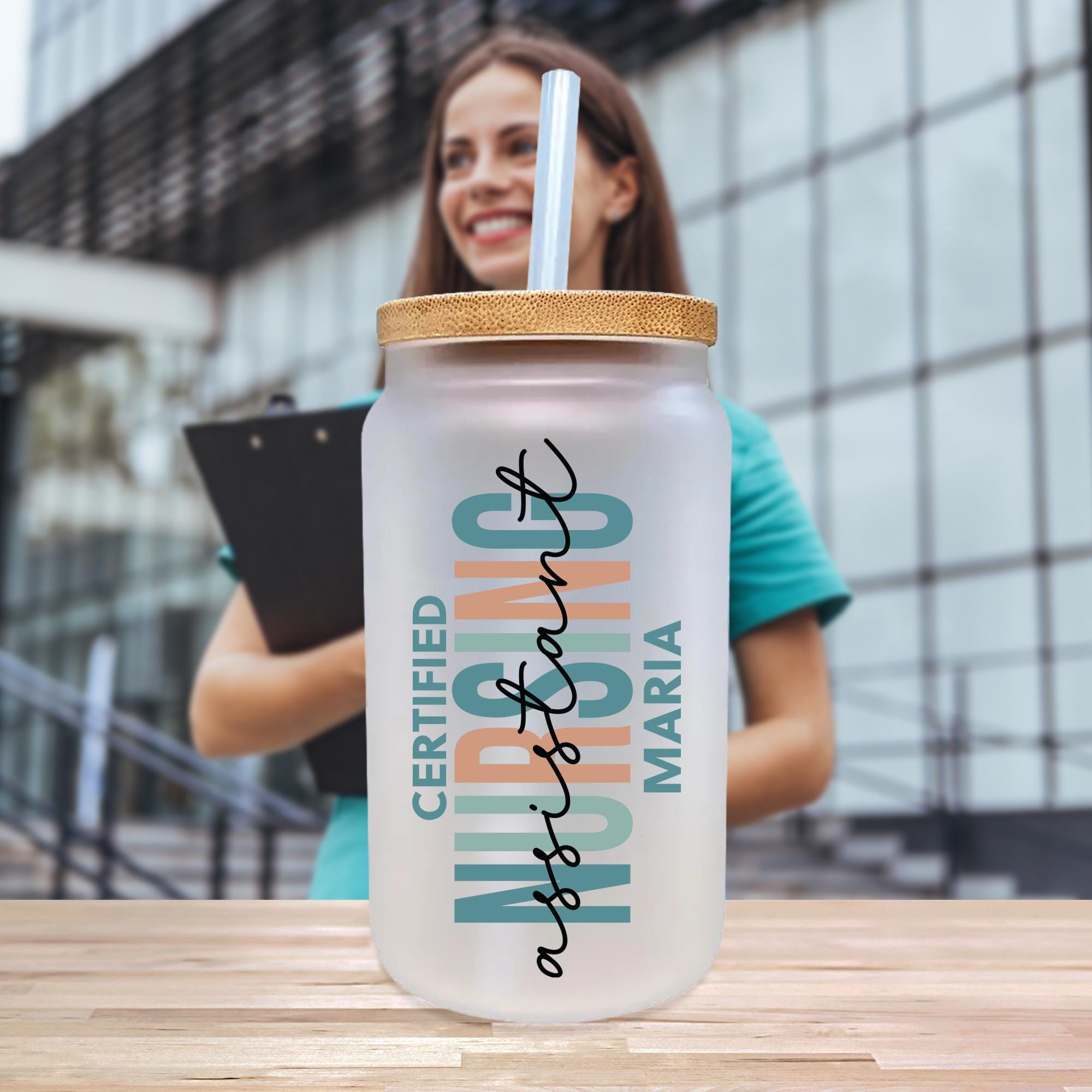 a woman holding a clipboard next to a water bottle