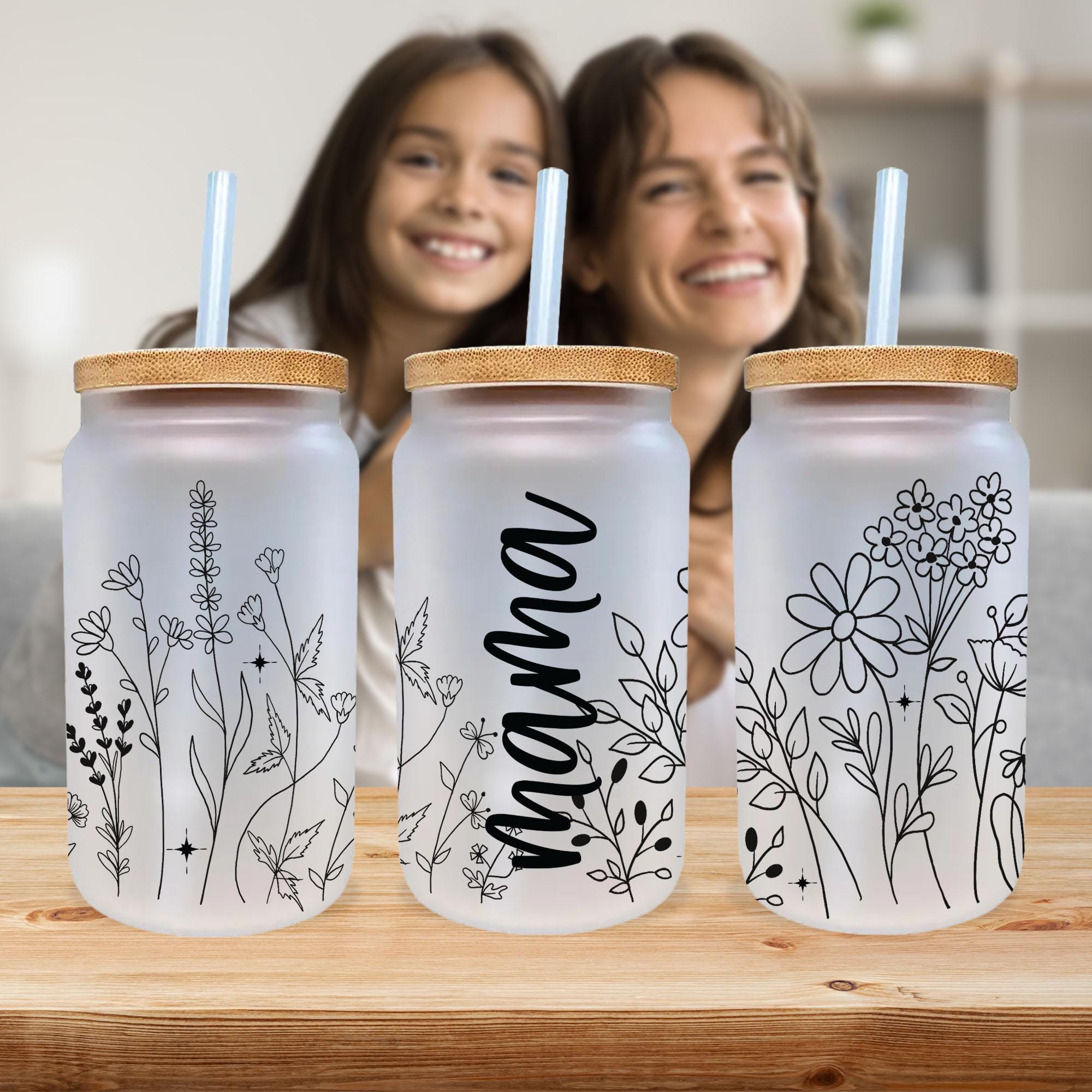 a woman is smiling next to three water bottles