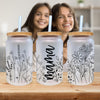 a woman is smiling next to three water bottles