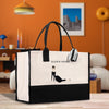a black and white shopping bag with a picture of a woman on it