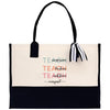 a black and white bag with a black handle